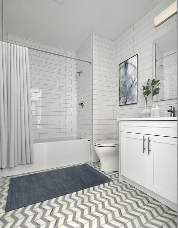 301 Border Street, Unit 311 Boston, MA 02128 - Photo 25 of 33 a bathroom with a sink a toilet and shower