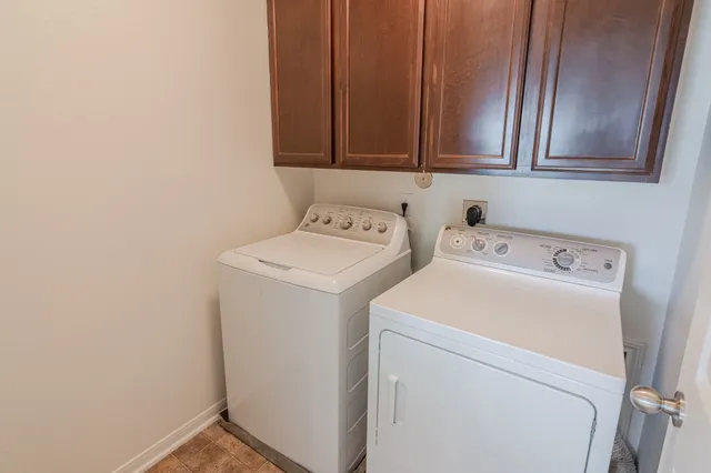 a view of room with window and ceiling fan