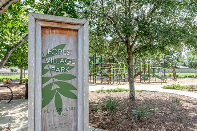 a view of a park with swings