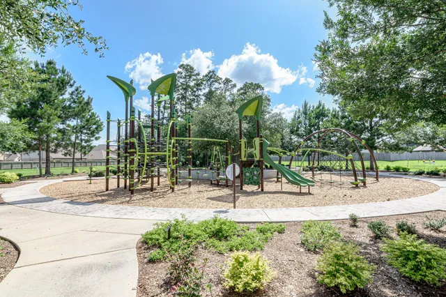 a view of a lake with a yard