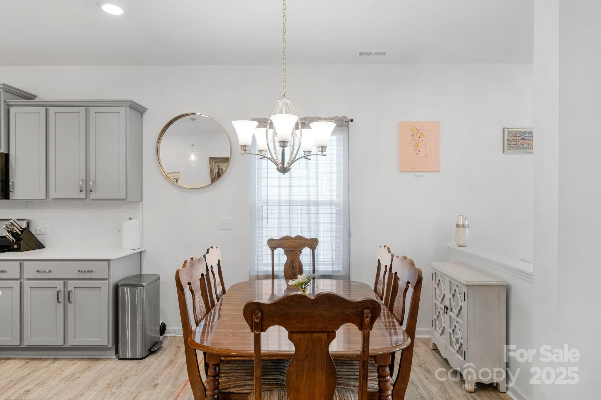 106 Aspire Circle Wingate, NC 28174 - Photo 16 of 39 a view of a dining room with furniture