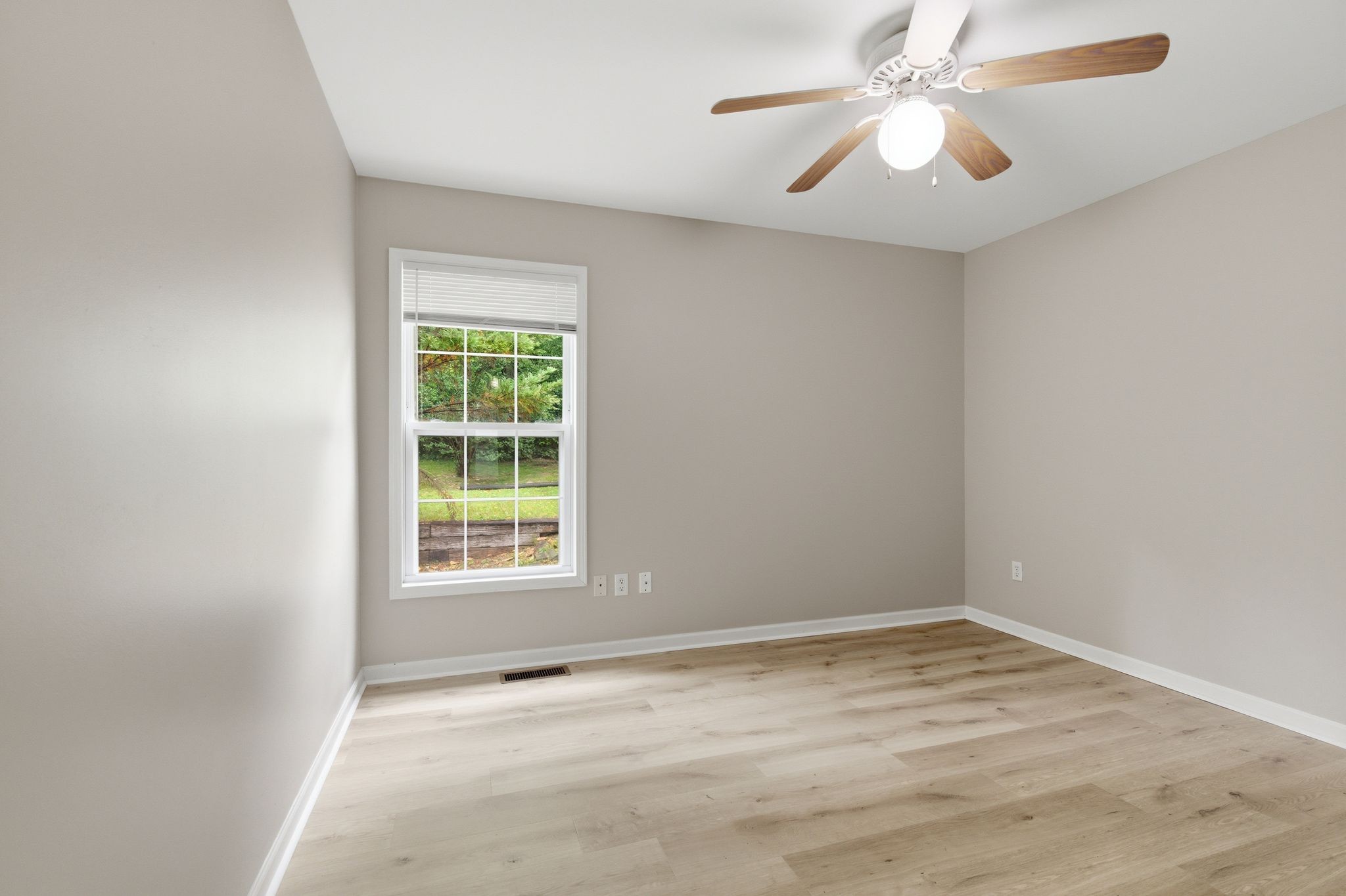 2642 Hibbitts Road Nashville, TN 37214 - Photo 21 of 29 an empty room with a window and a fan