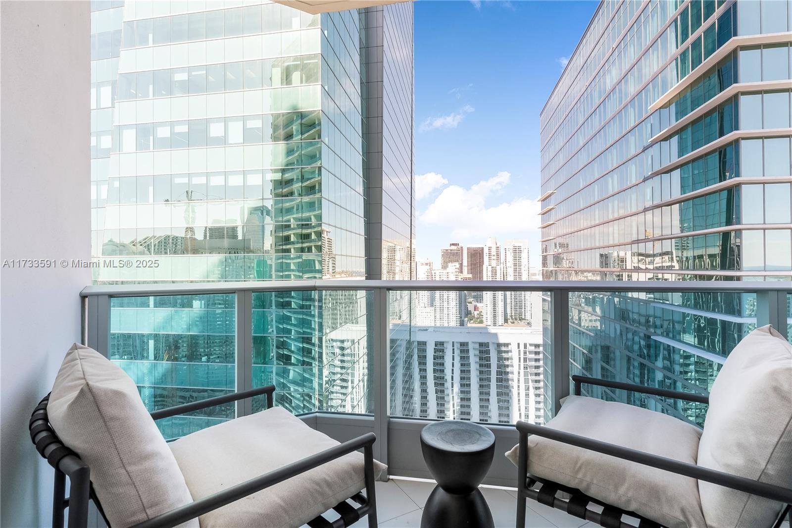 200 Biscayne Blvd Way, Unit 4101 Miami, FL 33131 - Photo 18 of 30 a view of a large window with chairs