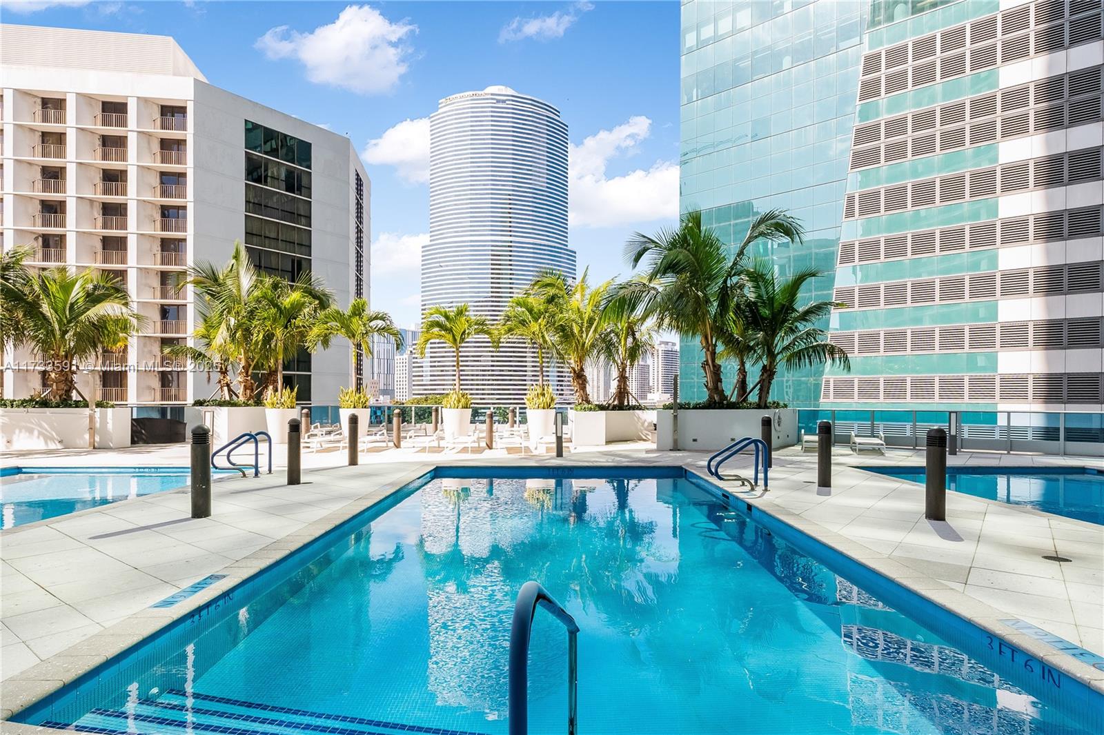 200 Biscayne Blvd Way, Unit 4101 Miami, FL 33131 - Photo 22 of 30 a swimming pool with outdoor seating
