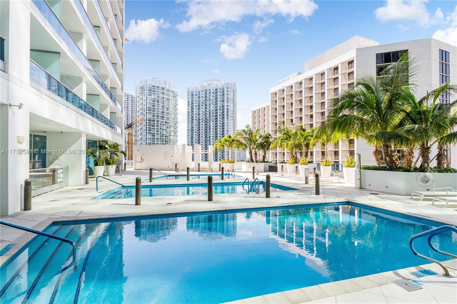 200 Biscayne Blvd Way, Unit 4101 Miami, FL 33131 - Photo 23 of 30 a view of swimming pool with outdoor seating and city view