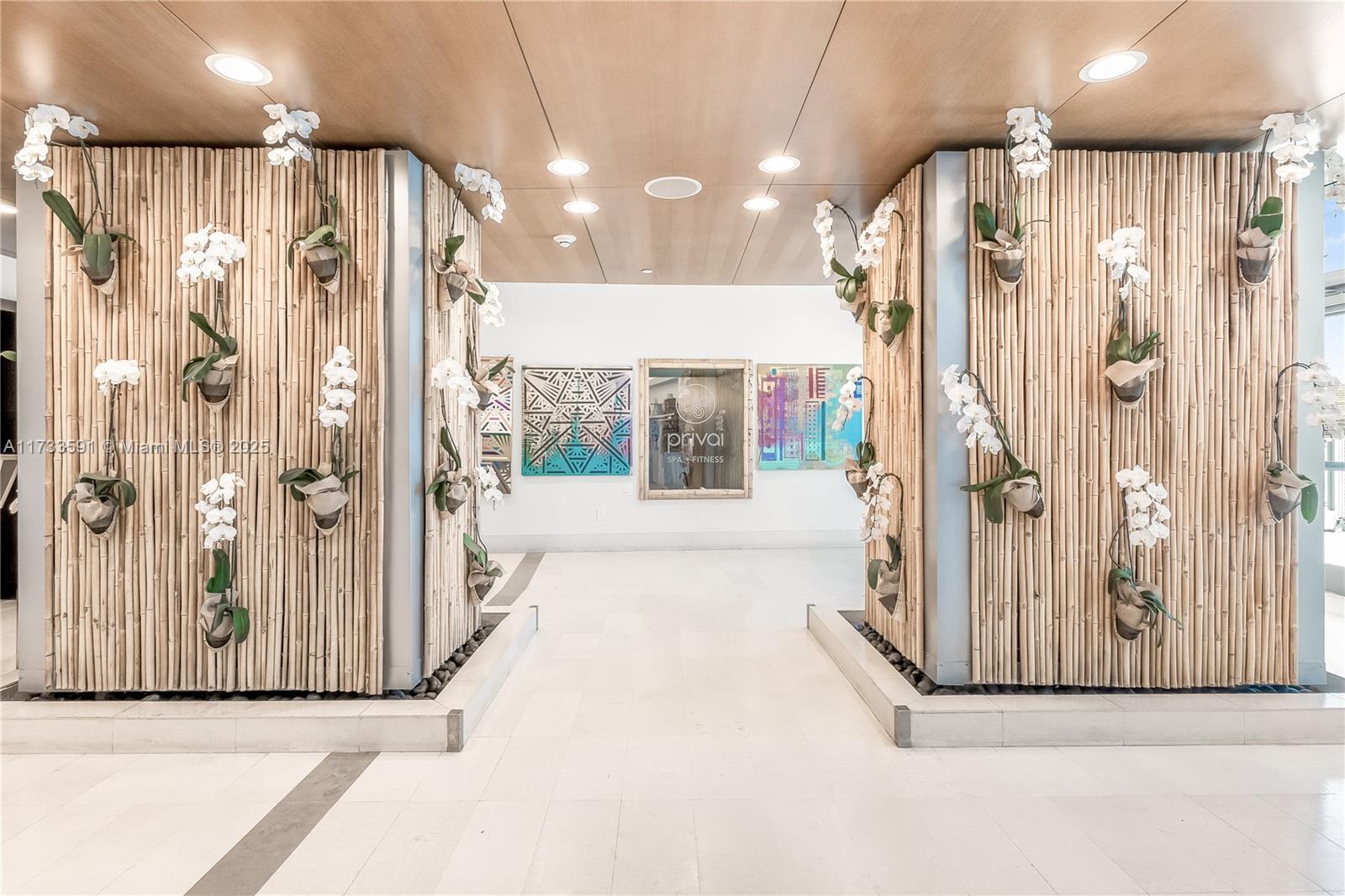 200 Biscayne Blvd Way, Unit 4101 Miami, FL 33131 - Photo 24 of 30 a view of a hallway with wooden floor and windows