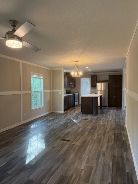 236 Dewaters Road Commerce, GA 30529 - Photo 5 of 18 a view of empty room with wooden floor and window