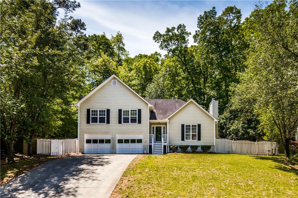 4865 Anise Street Southwest Austell, GA 30106 - Photo 1 of 1 a house view with a outdoor space