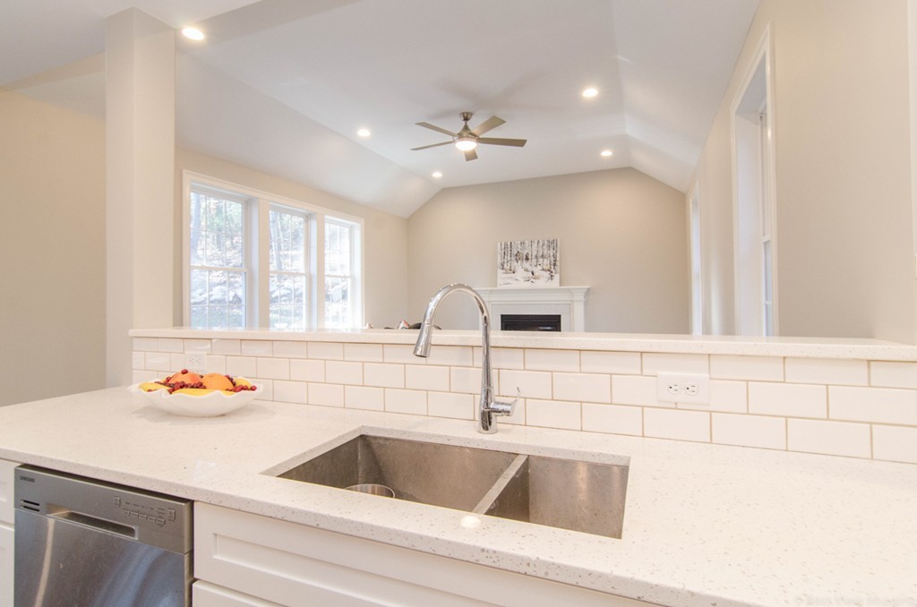 718 Main Street Acton, MA 01720 - Photo 12 of 28 a kitchen with sink cabinets and a window