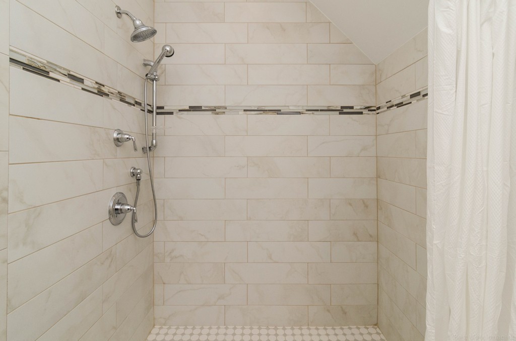 718 Main Street Acton, MA 01720 - Photo 24 of 28 a bathroom with a shower