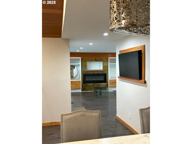 a kitchen with a sink cabinets and stainless steel appliances