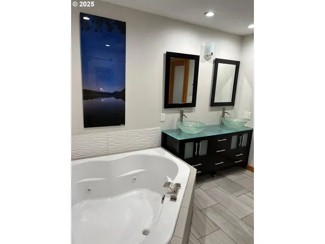 a view of a living room with a flat screen tv