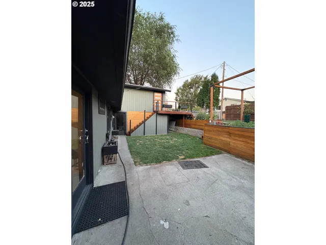 a view of a backyard with a garden