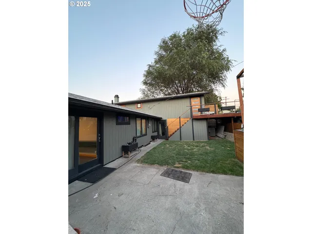 a house view with a backyard space