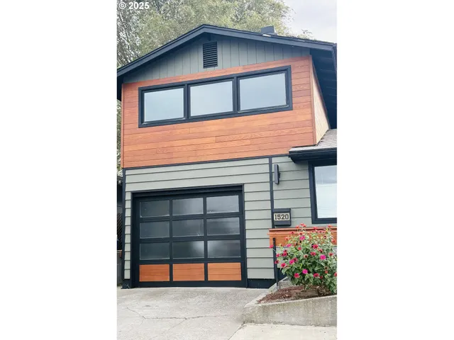 a view of a street with cars