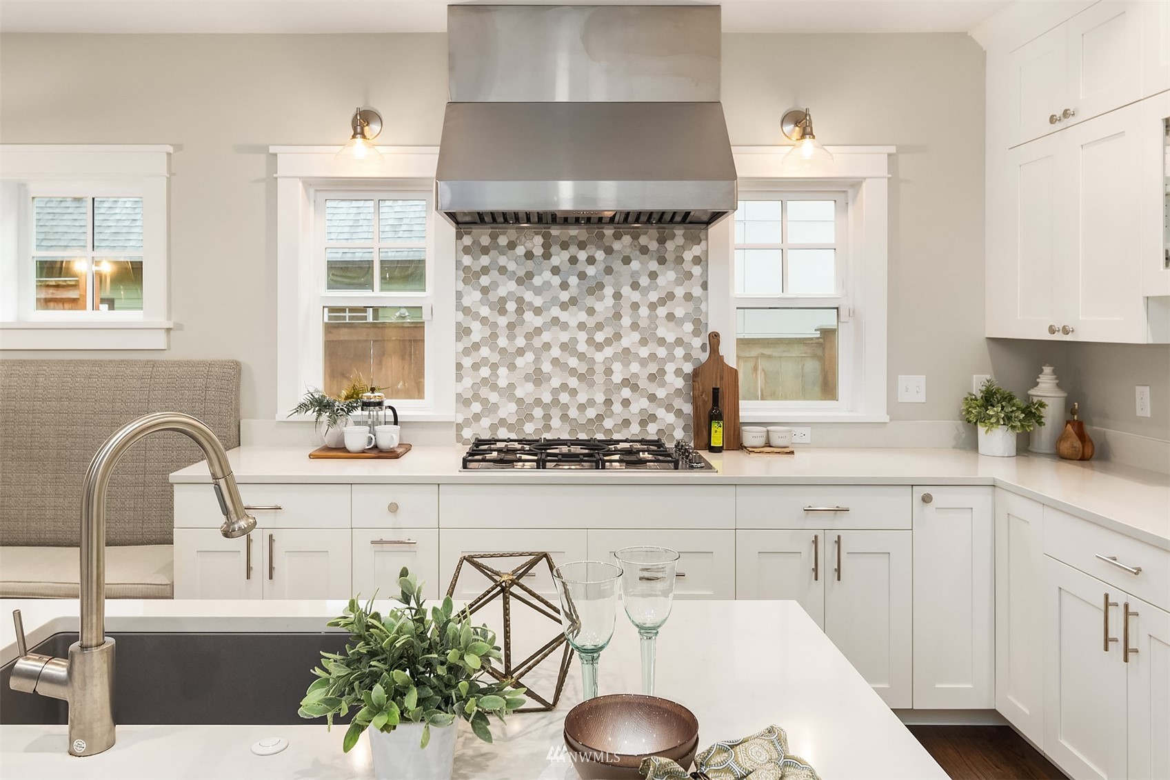6065 5th Avenue Northeast Seattle, WA 98115 - Photo 14 of 40 a kitchen with a sink and a stove top oven