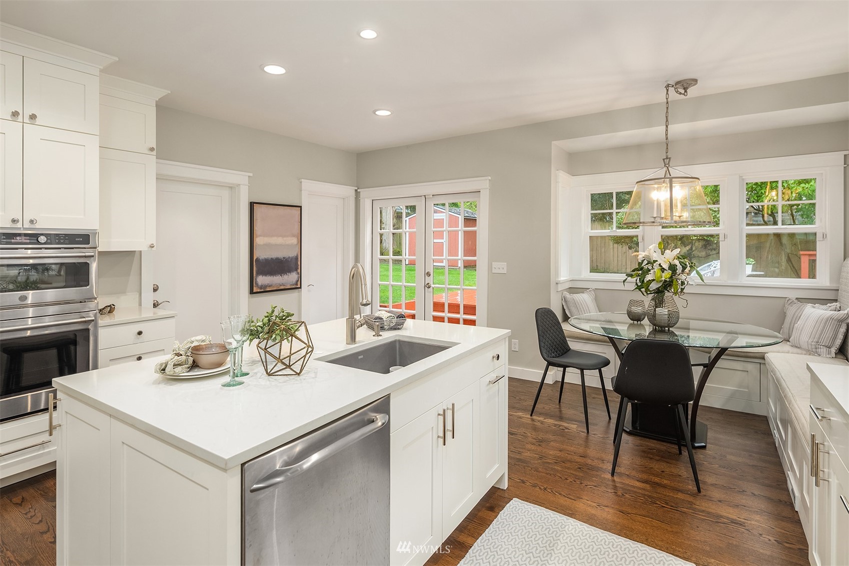 6065 5th Avenue Northeast Seattle, WA 98115 - Photo 17 of 40 a view of dining table and chairs