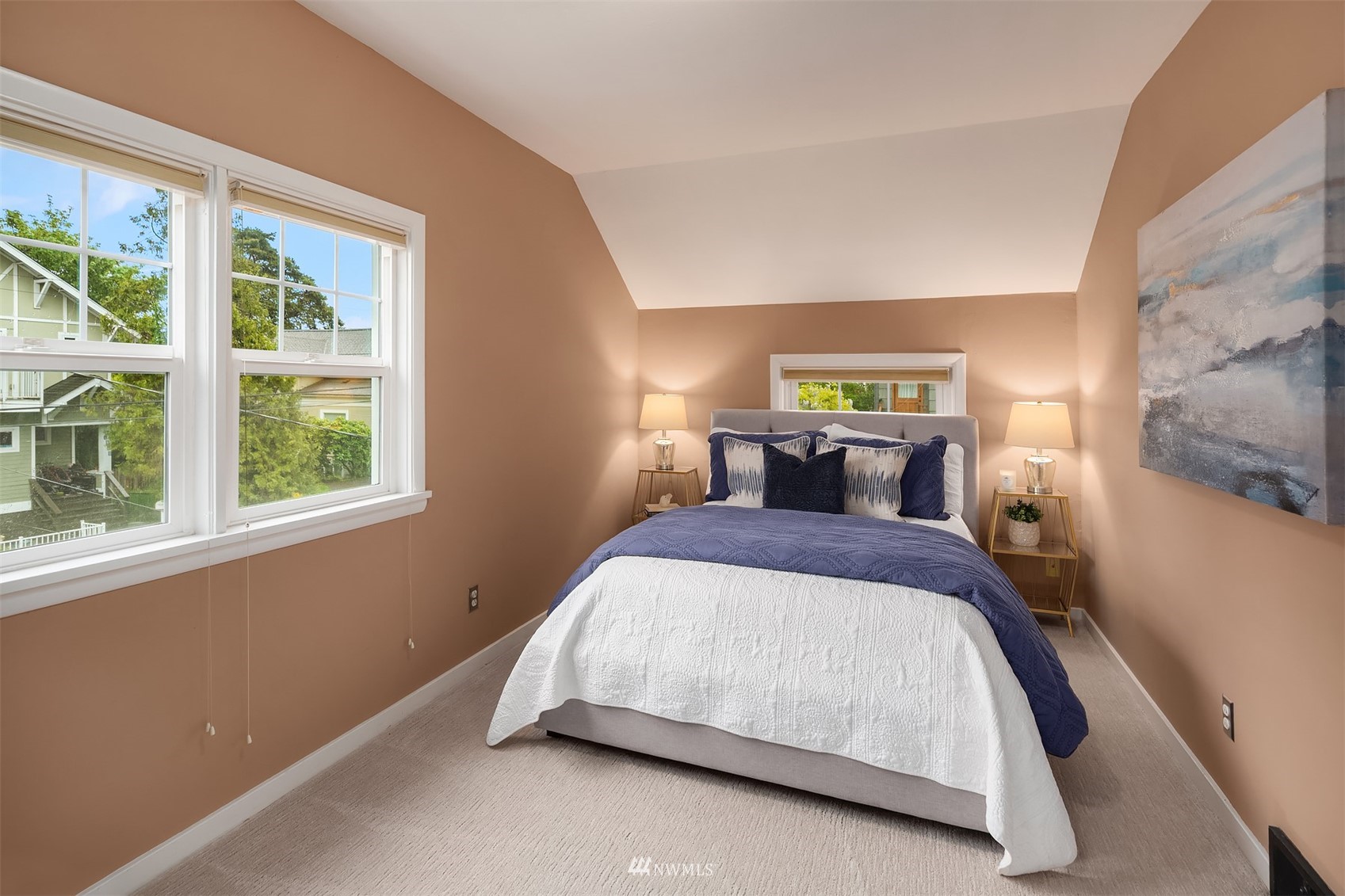 6065 5th Avenue Northeast Seattle, WA 98115 - Photo 21 of 40 a bedroom with a bed and window