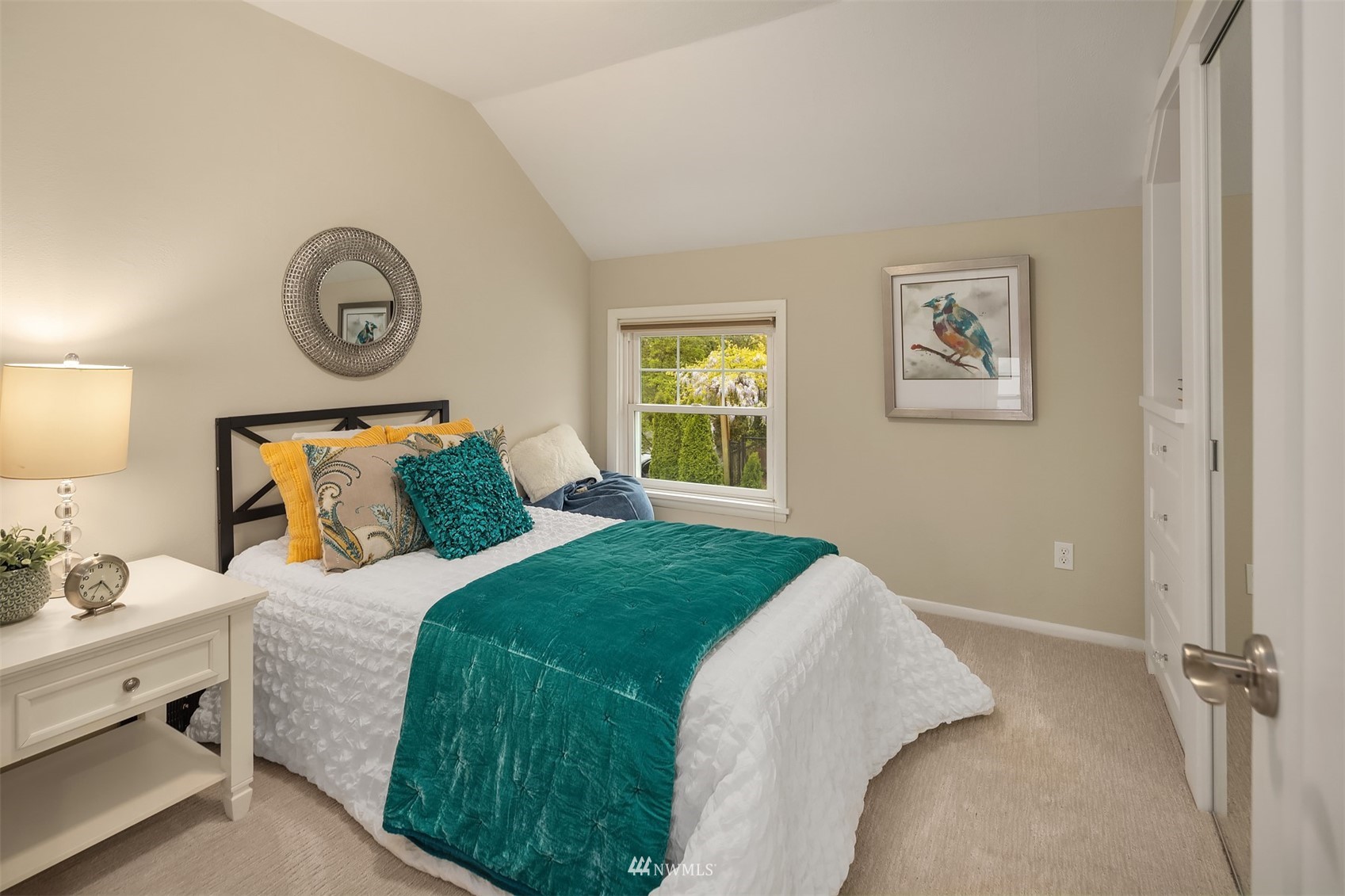 6065 5th Avenue Northeast Seattle, WA 98115 - Photo 22 of 40 a bedroom with a bed and a window