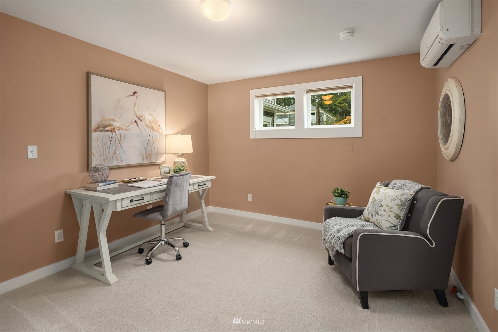 6065 5th Avenue Northeast Seattle, WA 98115 - Photo 27 of 40 a living room with furniture and a window