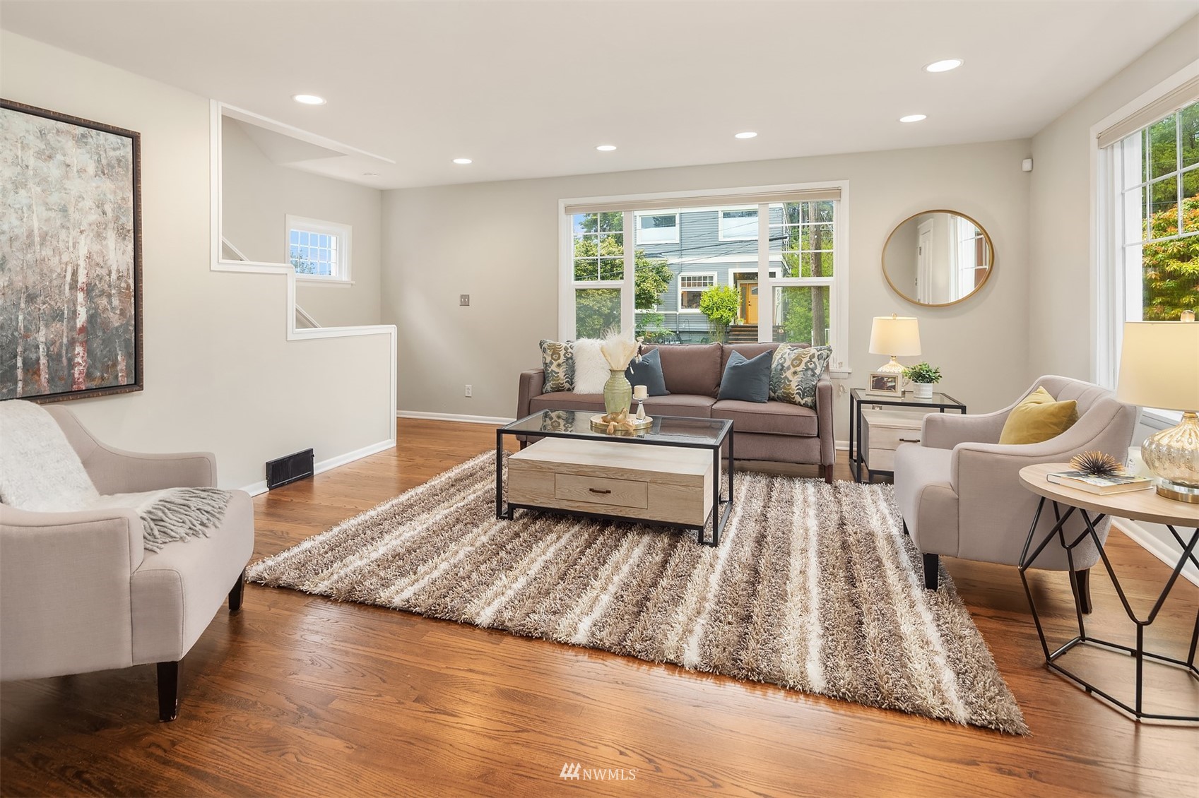 6065 5th Avenue Northeast Seattle, WA 98115 - Photo 3 of 40 a living room with furniture and a large window