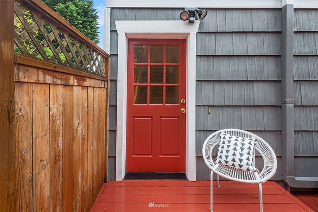 a view of a door and chair in a room