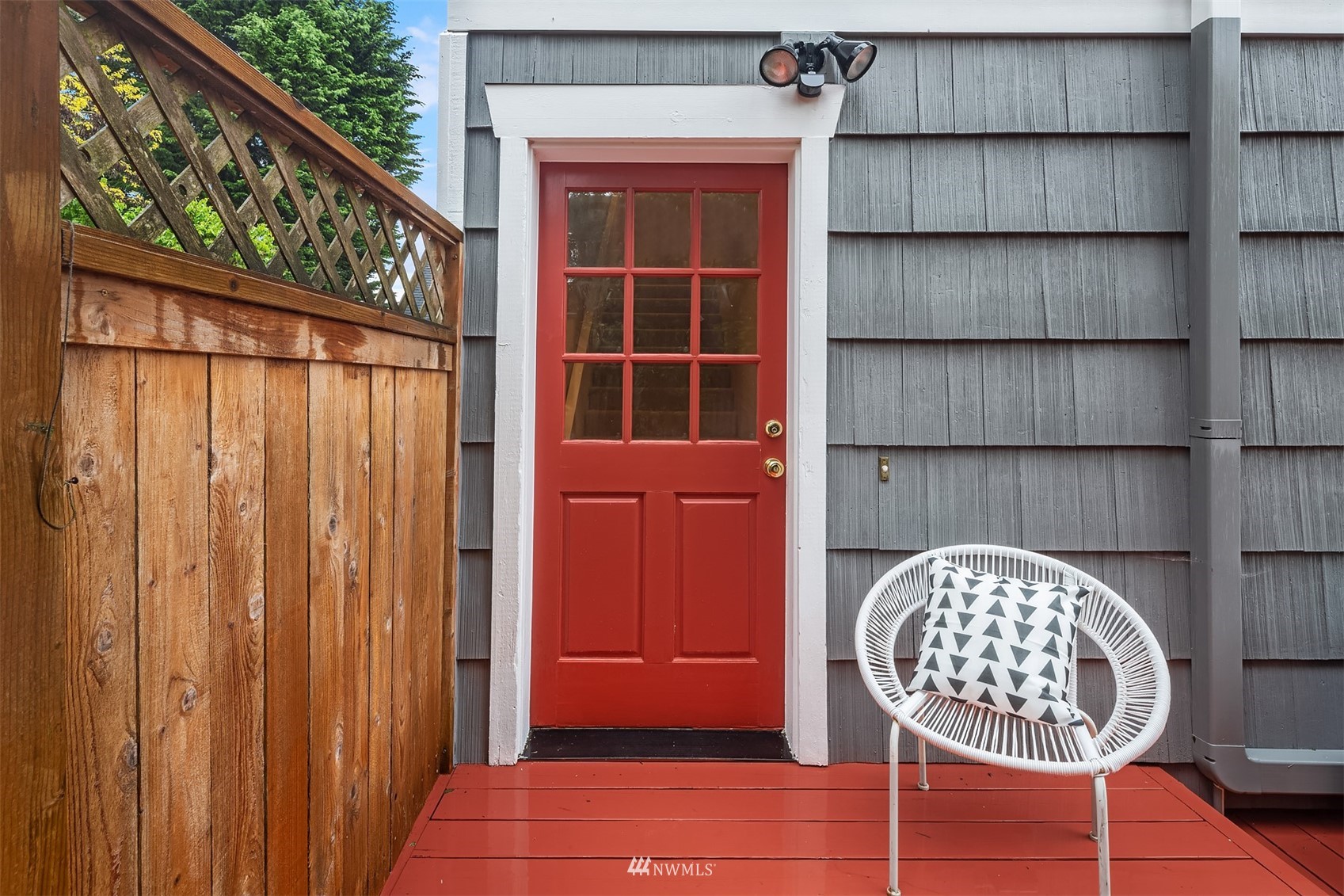 6065 5th Avenue Northeast Seattle, WA 98115 - Photo 33 of 40 a view of a door and chair in a room