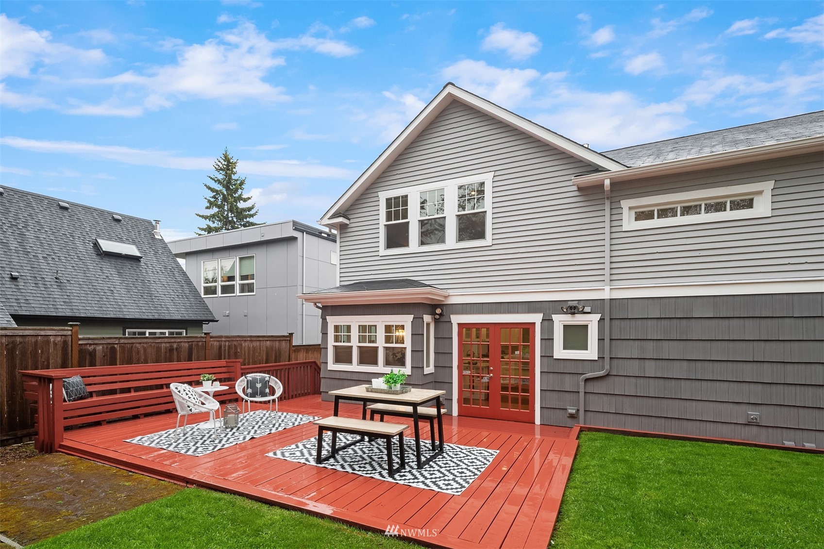 6065 5th Avenue Northeast Seattle, WA 98115 - Photo 35 of 40 a view of a house with a yard and sitting area