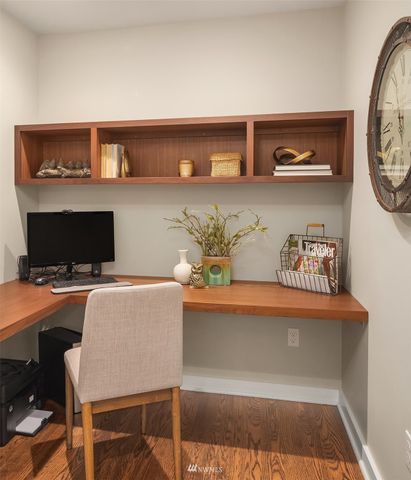 a workspace with furniture and lamp