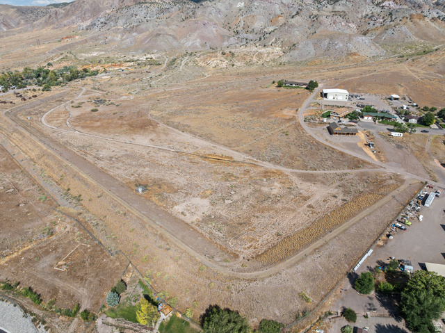 500 East Sand Canyon Road Monroe, UT 84754 - Photo 6 of 12 Aerial view of property and surrounding area with rural landscape and a mountain backdrop