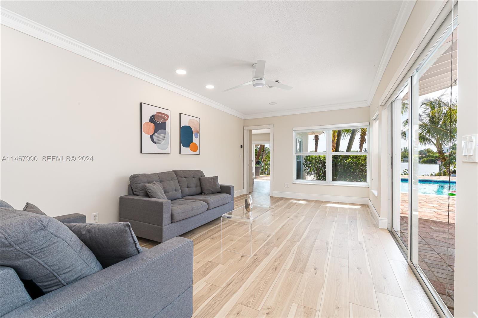 2500 Northeast 199th Street Miami, FL 33180 - Photo 21 of 72 a living room with furniture and a large window