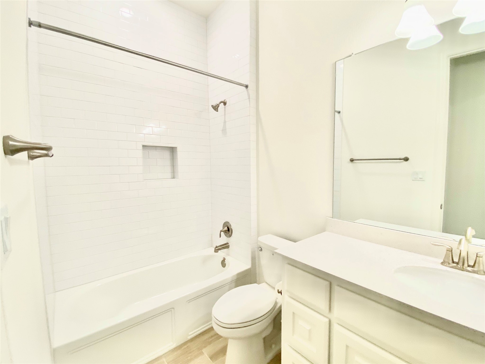 6009 Cimarron Ridge Lane Austin, TX 78738 - Photo 15 of 21 a bathroom with a sink a toilet and a bathtub