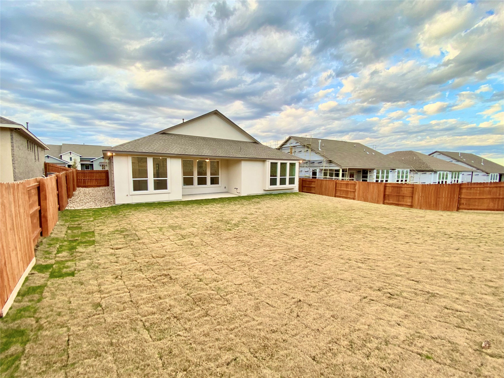 6009 Cimarron Ridge Lane Austin, TX 78738 - Photo 17 of 21 a view of a house with swimming pool and sitting area