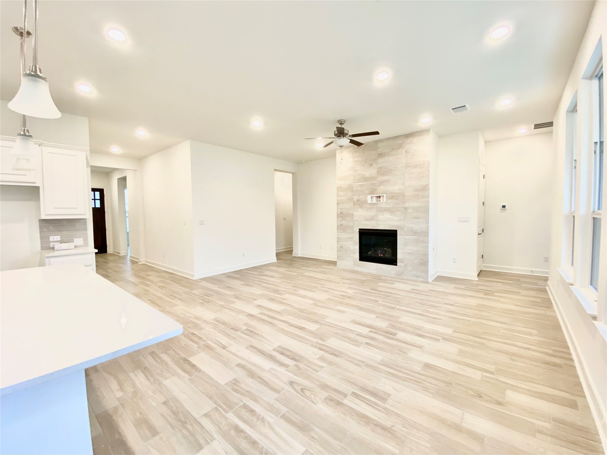 6009 Cimarron Ridge Lane Austin, TX 78738 - Photo 6 of 21 a view of a livingroom with a fireplace