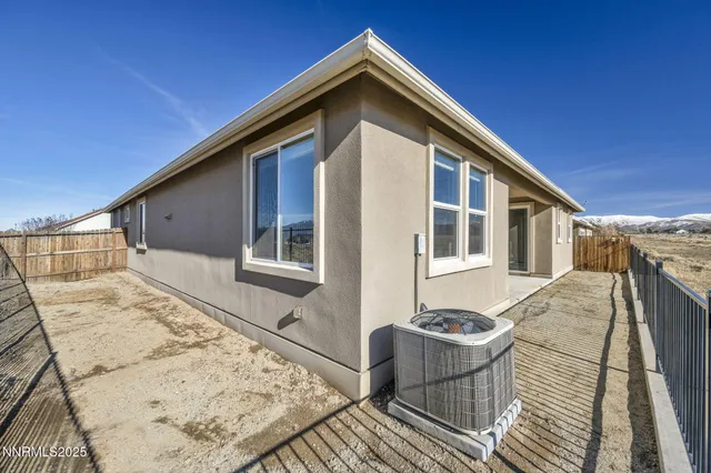 a view of balcony with wooden floor and a floor to ceiling window