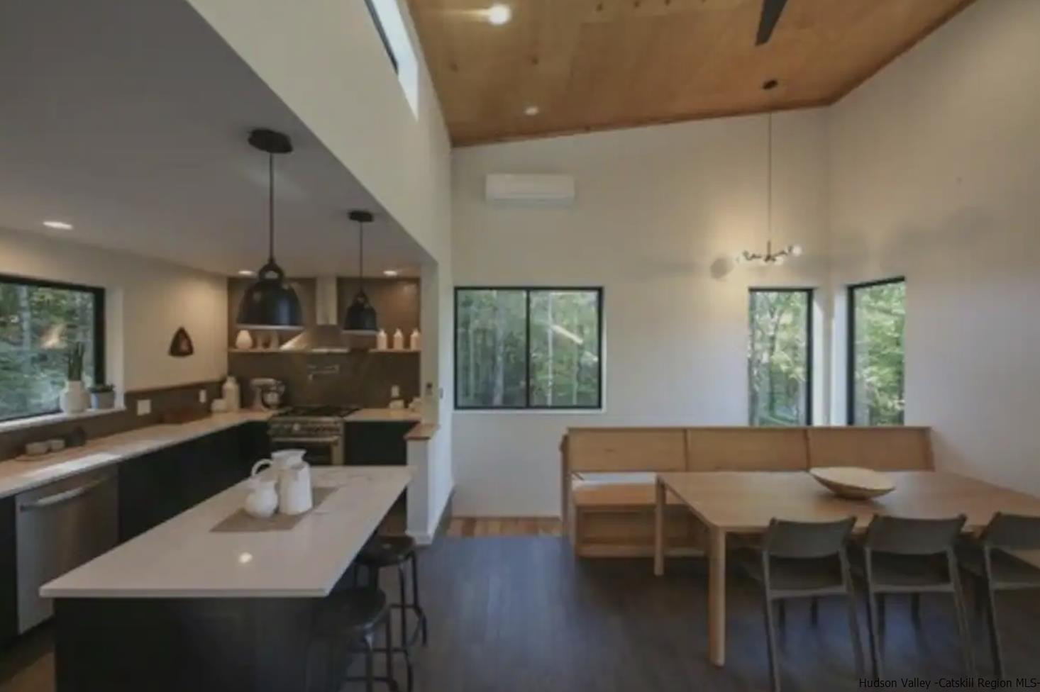 49 Aster Road Kerhonkson, NY 12446 - Photo 11 of 34 a view of a dining room with furniture and wooden floor