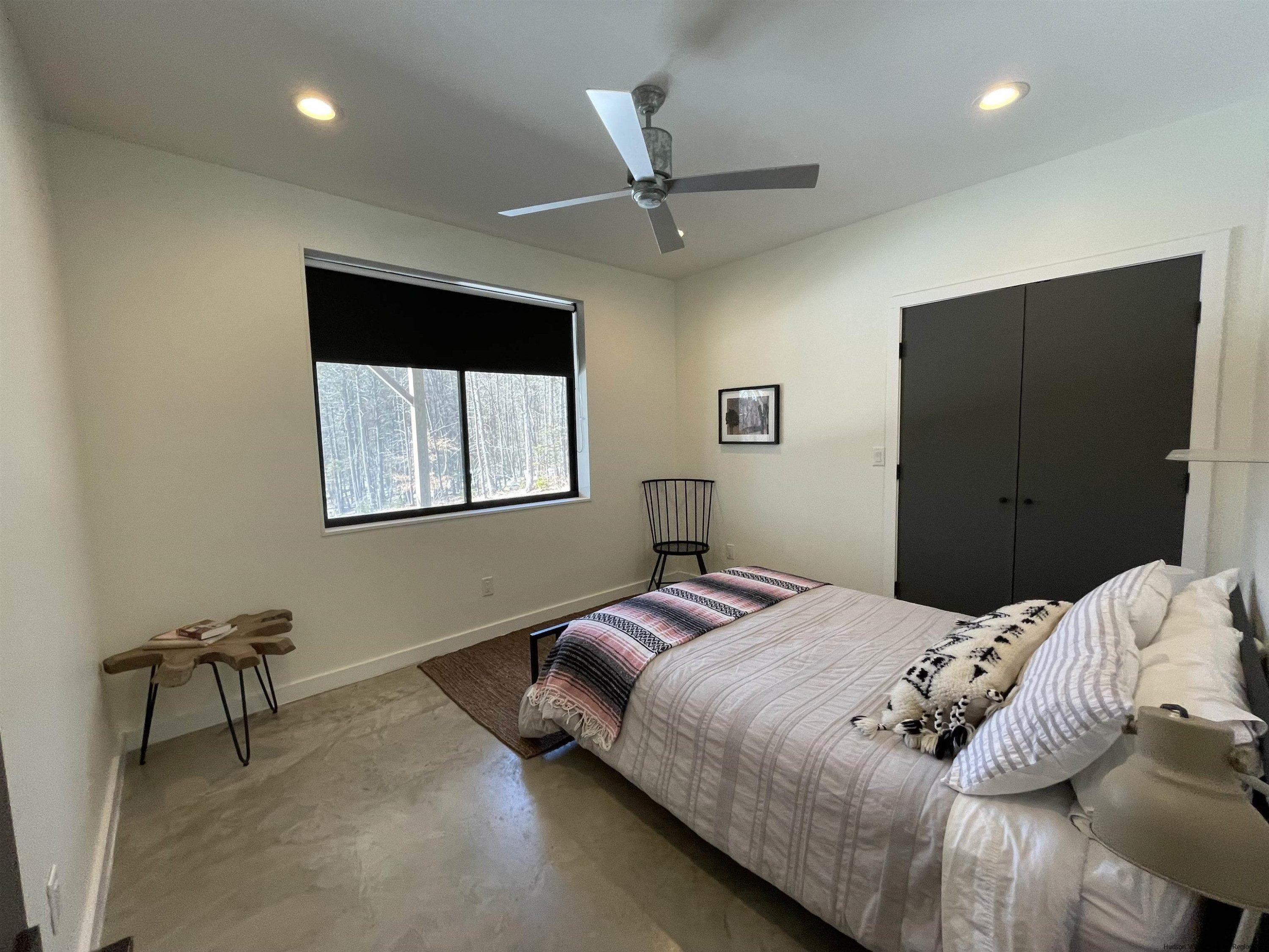 49 Aster Road Kerhonkson, NY 12446 - Photo 24 of 34 a bedroom with a bed and a dresser