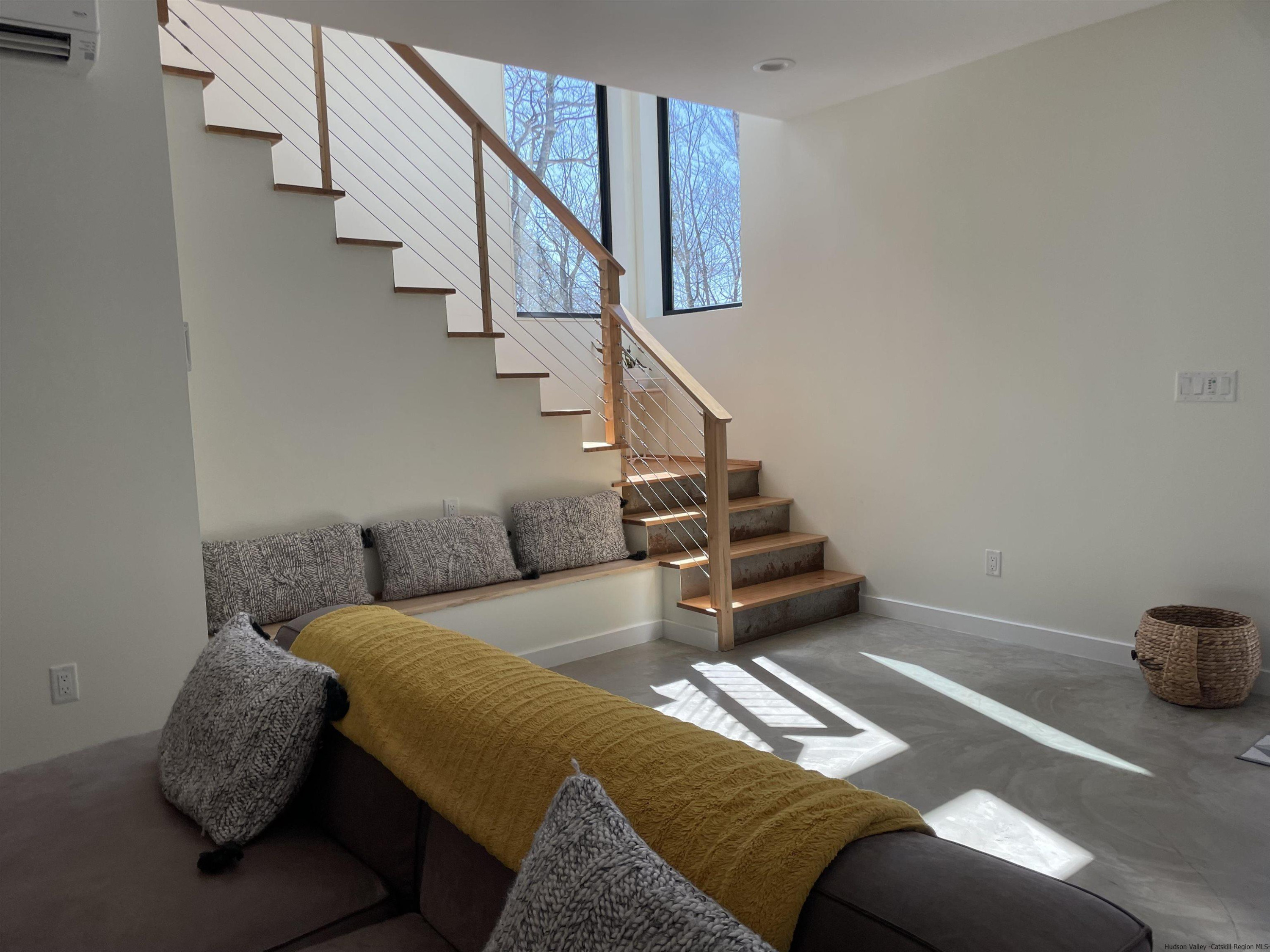 49 Aster Road Kerhonkson, NY 12446 - Photo 28 of 34 a bedroom with a bed and cabinets