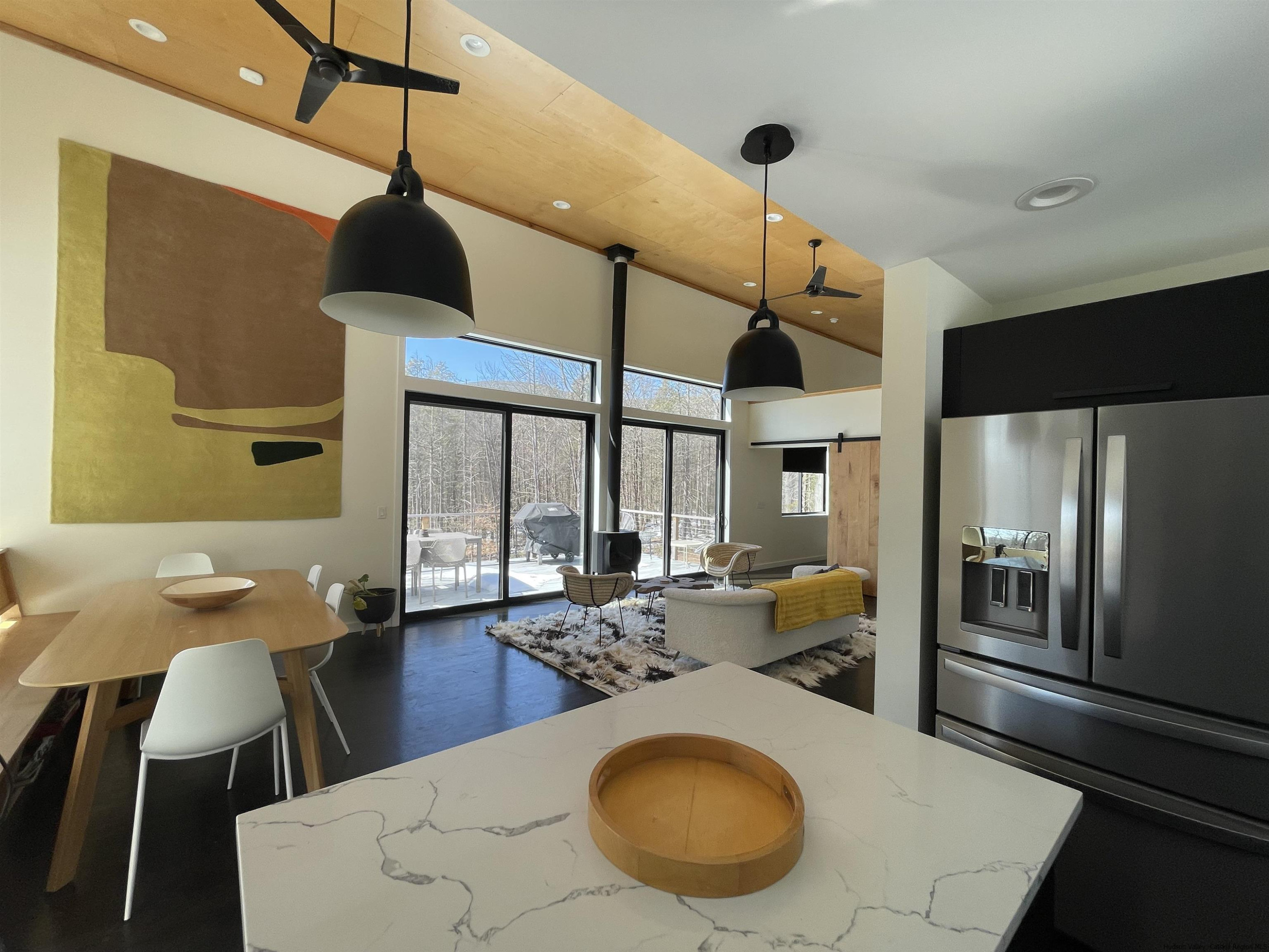 49 Aster Road Kerhonkson, NY 12446 - Photo 8 of 34 a large kitchen with a table and chairs