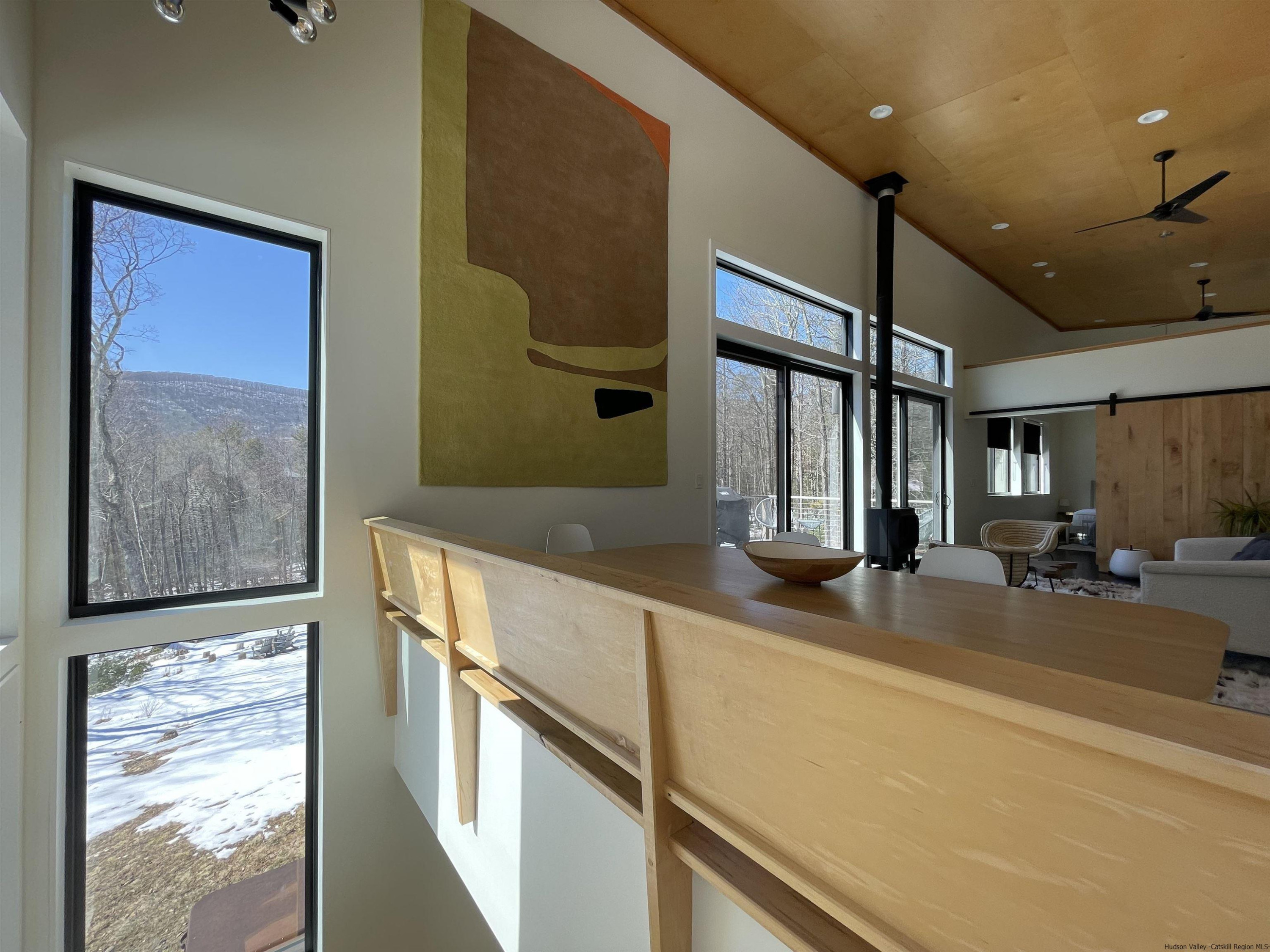 49 Aster Road Kerhonkson, NY 12446 - Photo 10 of 34 a kitchen with stainless steel appliances granite countertop a sink and a large window