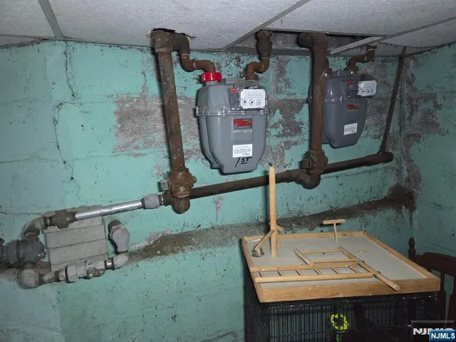 a picture of a bathroom with a sink and mirror