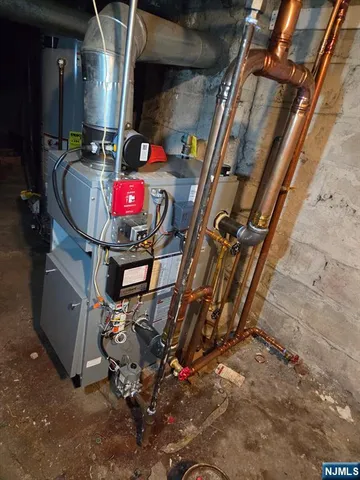 a view of gym equipment with racks on the wall