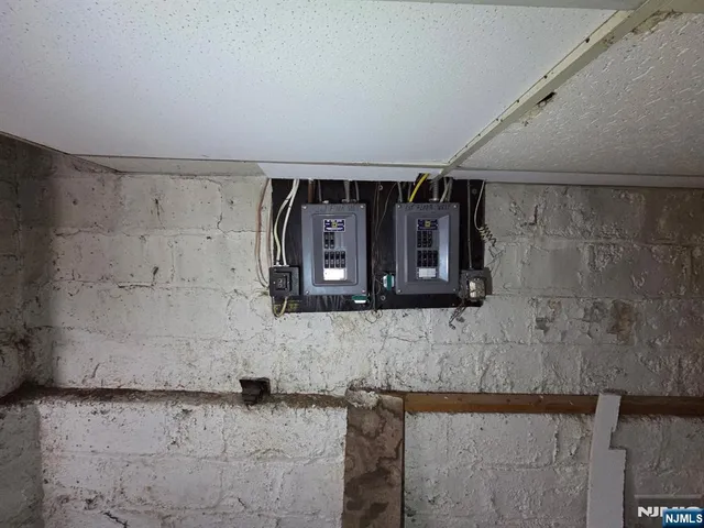 a bathroom with a shower and a sink