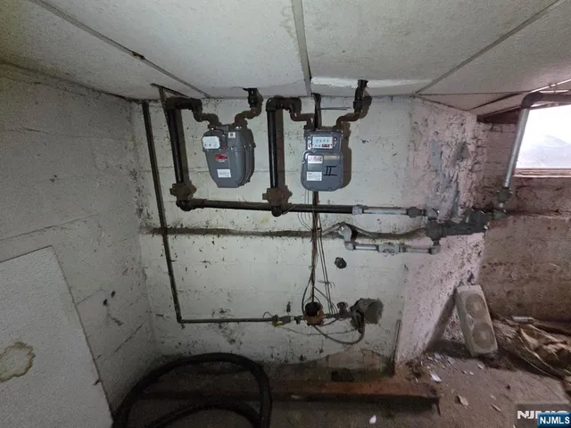 a front view of a house with car parked