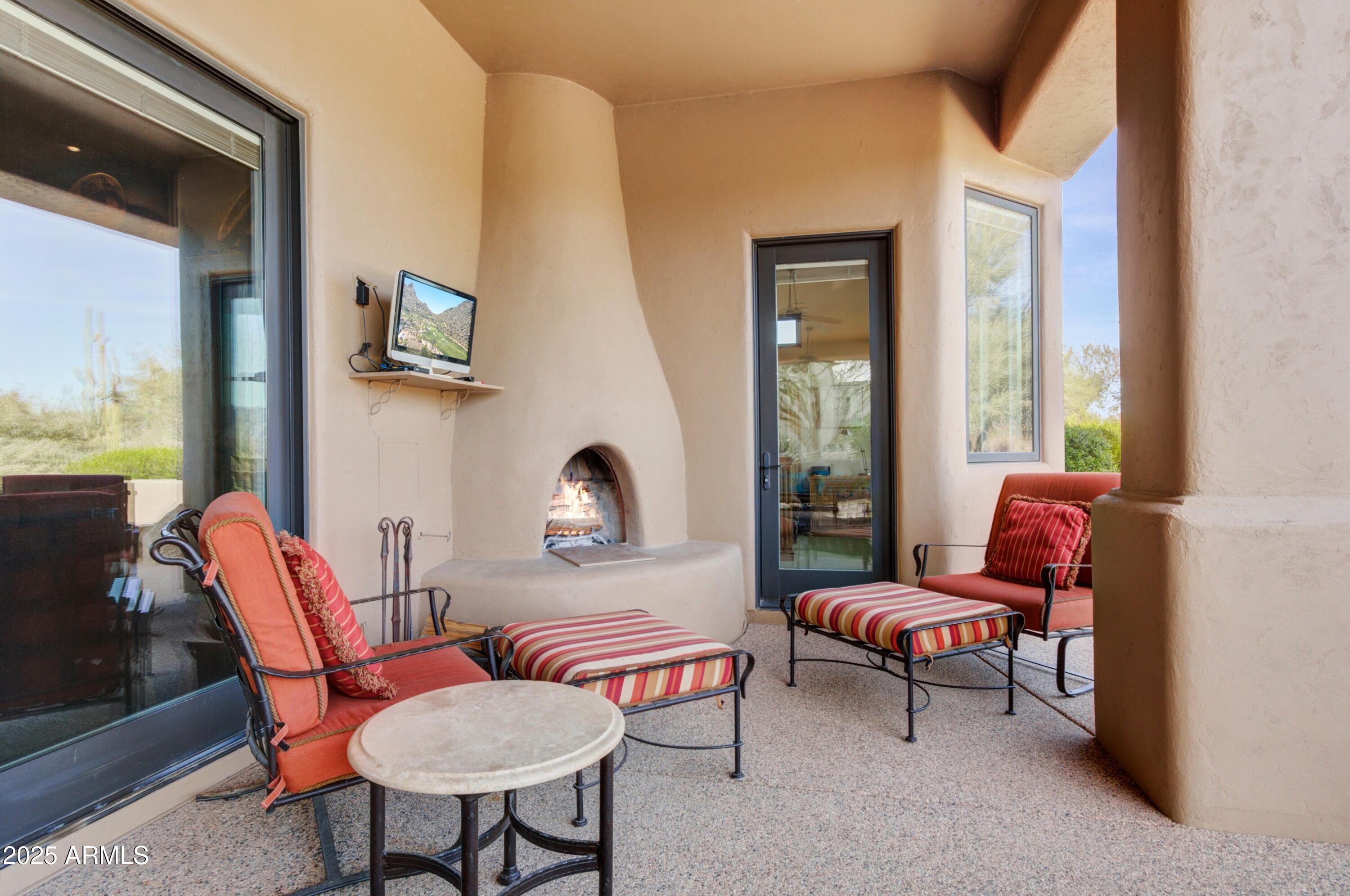 28013 Desierto Drive Rio Verde, AZ 85263 - Photo 22 of 33 a outdoor living room with furniture and a potted plant