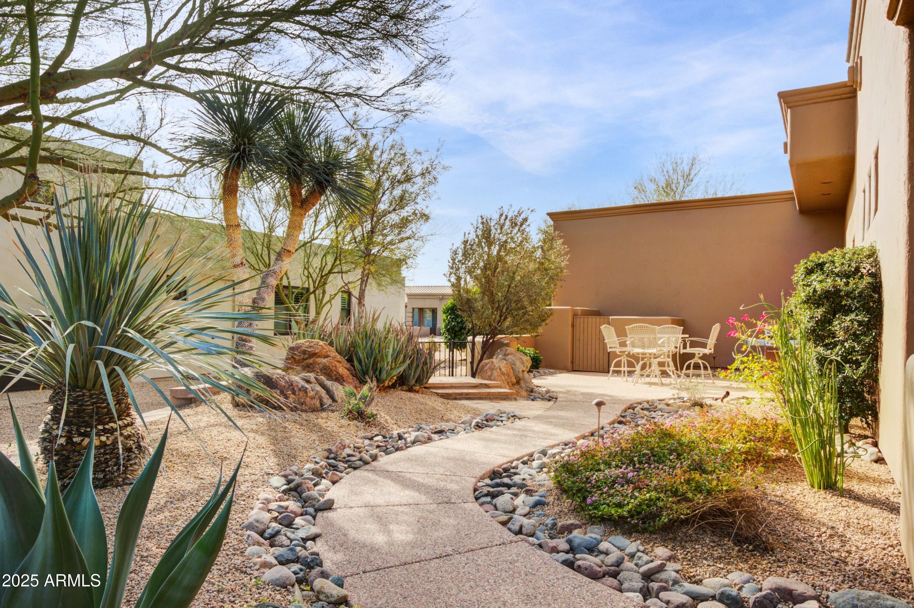 28013 Desierto Drive Rio Verde, AZ 85263 - Photo 26 of 33 a view of a backyard of the house