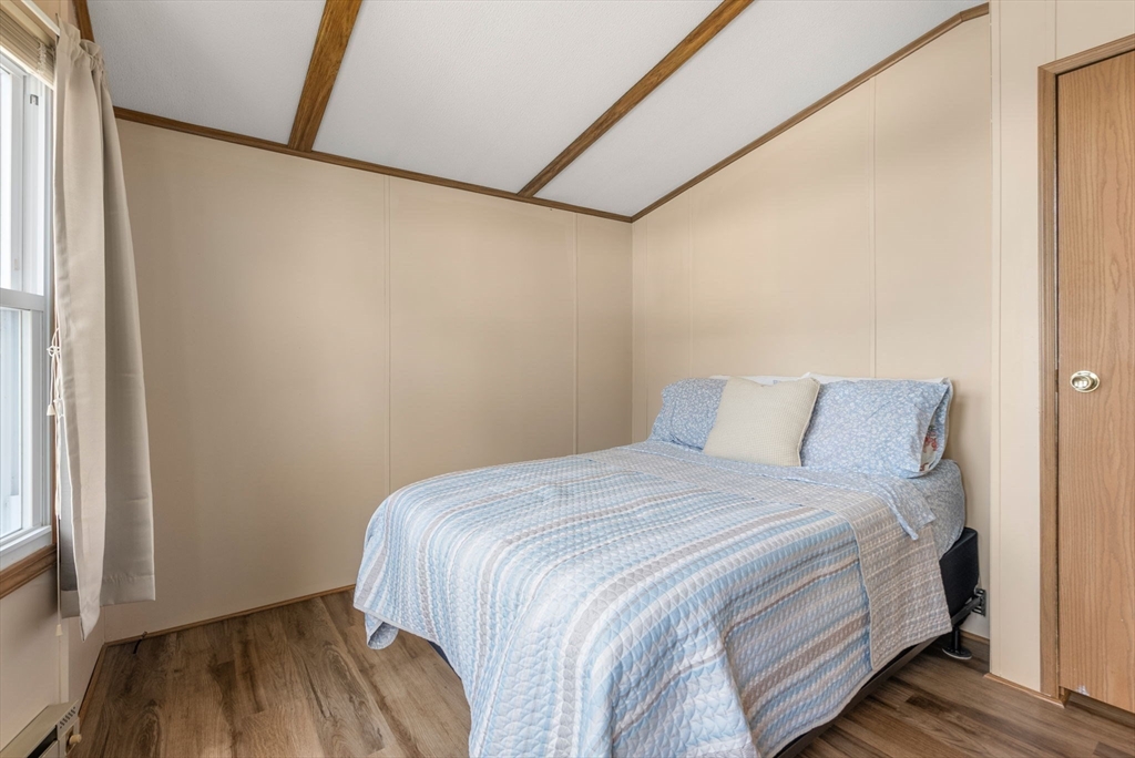 231 Park Circle Sturbridge, MA 01566 - Photo 21 of 32 a bedroom with a bed and a window