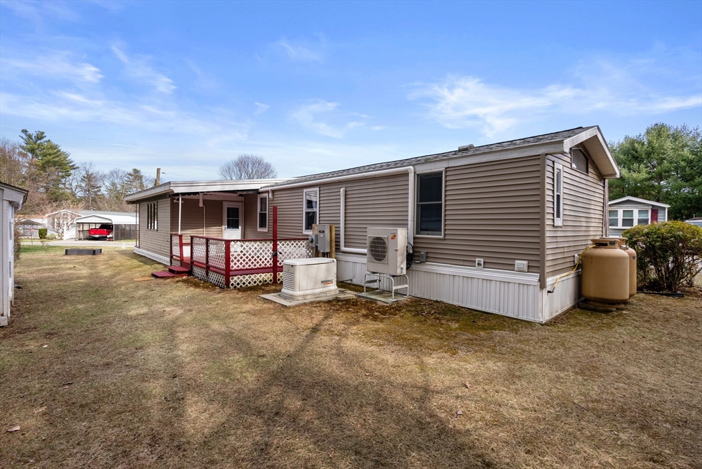 231 Park Circle Sturbridge, MA 01566 - Photo 30 of 32 a view of a house with a patio