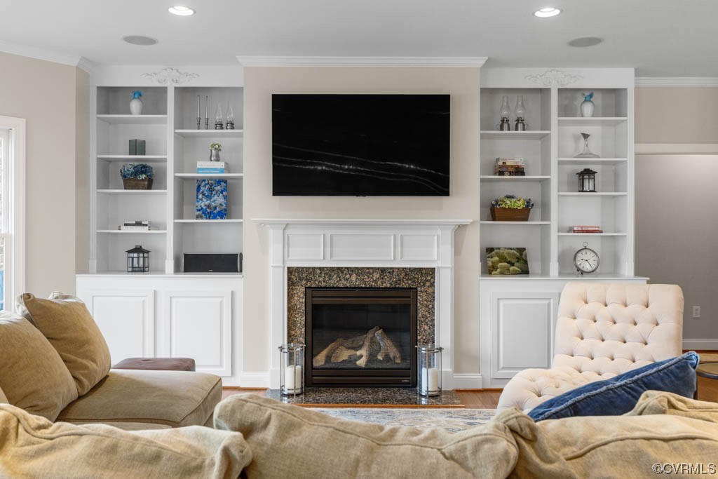 4318 Elmstone Road Midlothian, VA 23113 - Photo 19 of 47 a living room with furniture fireplace and flat screen tv