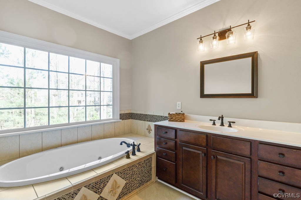 4318 Elmstone Road Midlothian, VA 23113 - Photo 23 of 47 a bathroom with a tub sink and mirror